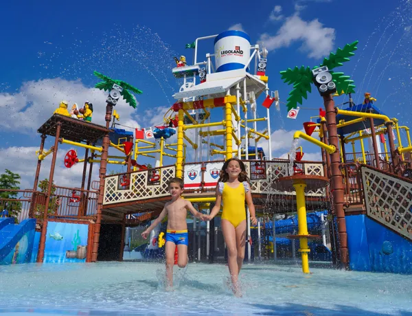 Cool down with splashes, sprays & slides at our Water Playground.