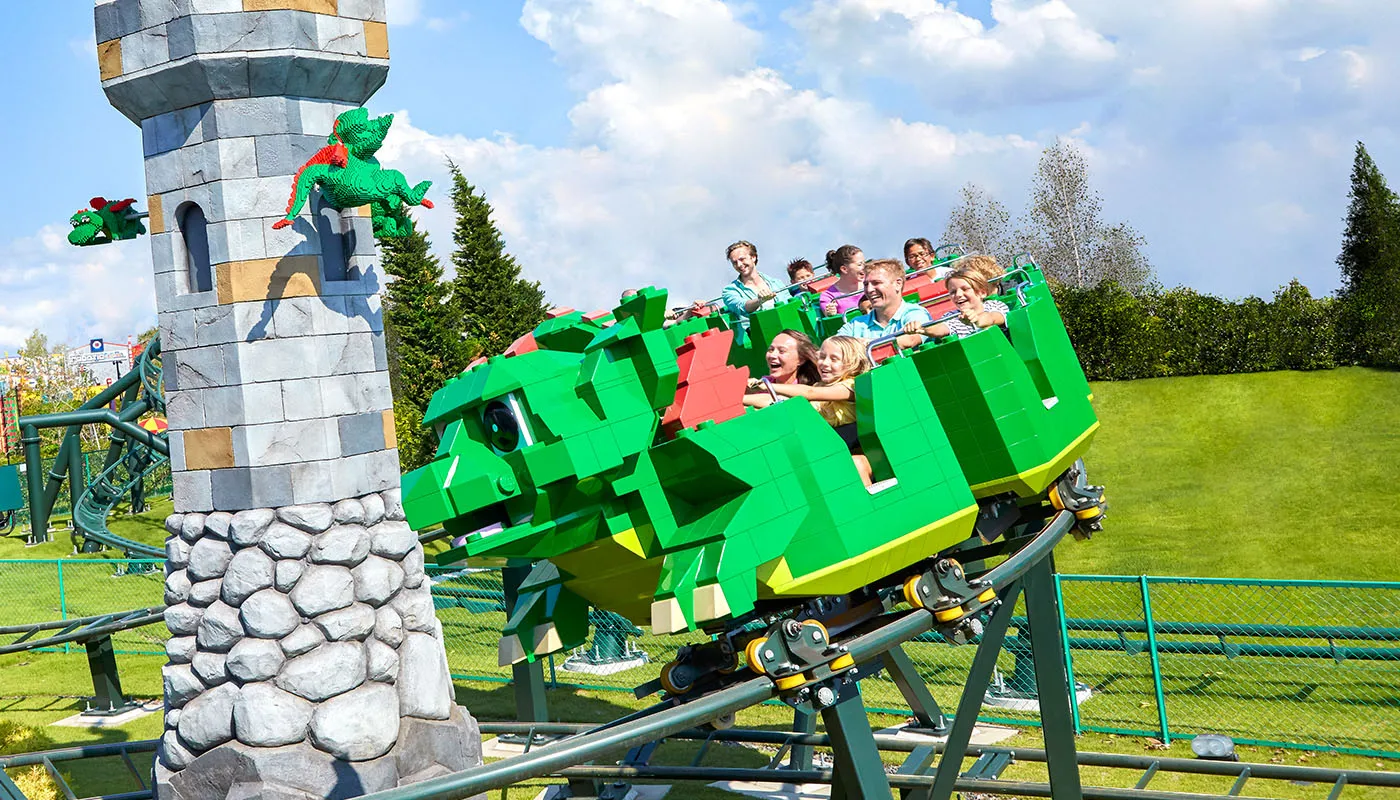Family Smiling on Dragons Apprentice Ride