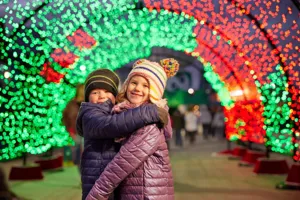 Kids under Light Tunnel during Holiday Bricktacular