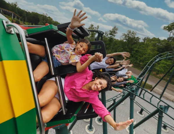 Mom and daughter ride the Dragon coaster together at LEGOLAND New York.
